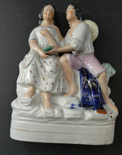 Load image into Gallery viewer, Antique 19th Century Staffordshire Figurine. Couple with a Nest 
