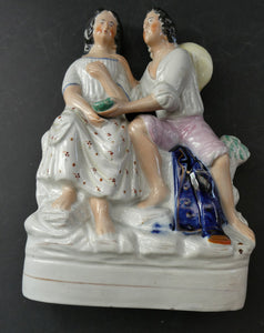 Antique 19th Century Staffordshire Figurine. Couple with a Nest 