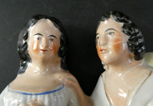 Antique 19th Century Staffordshire Figurine. Couple with a Nest 