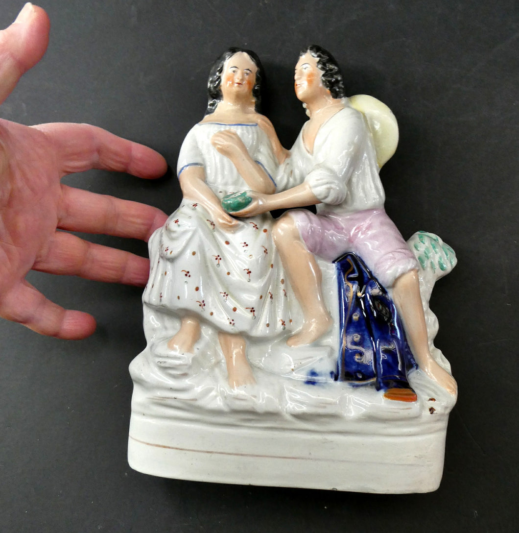 Antique 19th Century Staffordshire Figurine. Couple with a Nest 