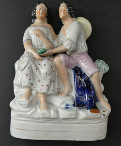 Antique 19th Century Staffordshire Figurine. Couple with a Nest 