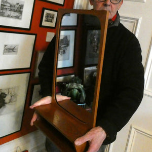 1960s DANISH Pedersen & Hansen (P&H) wall mirror in a teak wooden frame with a small integrated shelf.