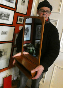 1960s DANISH Pedersen & Hansen (P&H) wall mirror in a teak wooden frame with a small integrated shelf.