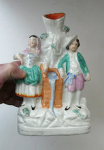 Load image into Gallery viewer, Antique STAFFORDSHIRE Flatback Figurine / SPILL VASE. Victorian Couple Standing Beside a Water Wall
