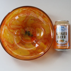 Rare MDINA (Malta)  Shallow Orange Glass Footed Bowl with Yellow and Red Swirls. Etched Signature on the Base