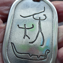 Load image into Gallery viewer, Vintage Norwegian Pewter Pendant Cave Carving Images
