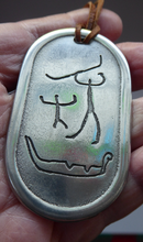 Load image into Gallery viewer, Vintage Norwegian Pewter Pendant Cave Carving Images
