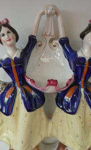 Antique Staffordshire Figurine. Pair of Scottish Lasses Dancing. Antique Ceramic Pocket Watch Holder