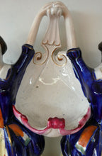 Load image into Gallery viewer, Antique Staffordshire Figurine. Pair of Scottish Lasses Dancing. Antique Ceramic Pocket Watch Holder

