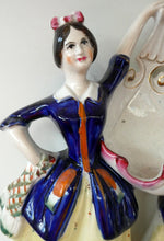 Load image into Gallery viewer, Antique Staffordshire Figurine. Pair of Scottish Lasses Dancing. Antique Ceramic Pocket Watch Holder
