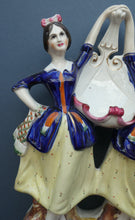 Load image into Gallery viewer, Antique Staffordshire Figurine. Pair of Scottish Lasses Dancing. Antique Ceramic Pocket Watch Holder
