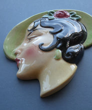 Load image into Gallery viewer, 1930s ART DECO Wall Mask by Cope &amp; Co. Art Deco Lady with Green Bonnet with Pink Flower. Black Hair
