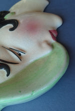 Load image into Gallery viewer, 1930s ART DECO Wall Mask by Cope &amp; Co. Art Deco Lady with Green Bonnet with Pink Flower. Black Hair
