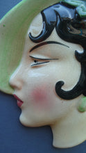 Load image into Gallery viewer, 1930s ART DECO Wall Mask by Cope &amp; Co. Art Deco Lady with Green Bonnet with Pink Flower. Black Hair
