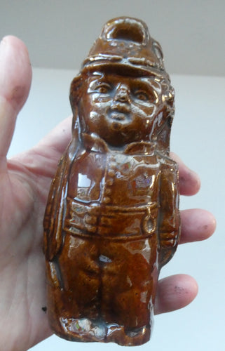 Antique Staffordshire / Scottish 19th Century Bank or Money Box with Treacle Glaze. In the form of a Little Double-Sided Man