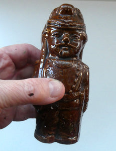 Antique Staffordshire / Scottish 19th Century Bank or Money Box with Treacle Glaze. In the form of a Little Double-Sided Man