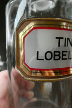 Load image into Gallery viewer, Larger Antique Clear Glass Chemist Bottle. TINCT: LOBEL: AETH with Original Foil Label and Lozenge Stopper
