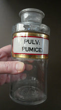 Load image into Gallery viewer, Large Antique Clear Glass Chemist Bottle. PULV: PUMICE: with Original Foil Label and Ball Stopper
