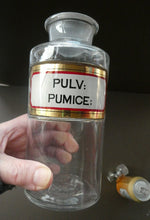 Load image into Gallery viewer, Large Antique Clear Glass Chemist Bottle. PULV: PUMICE: with Original Foil Label and Ball Stopper
