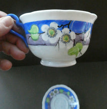 Load image into Gallery viewer, Vintage 1920s Hand Painted MAK MERRY Trio: Cup, Saucer and Side Plate. White Prunus on Blue
