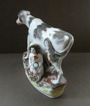 Load image into Gallery viewer, Genuine ANTIQUE STAFFORDSHIRE Figurine. Woman / Milkmaid with Large Cow; 1880s
