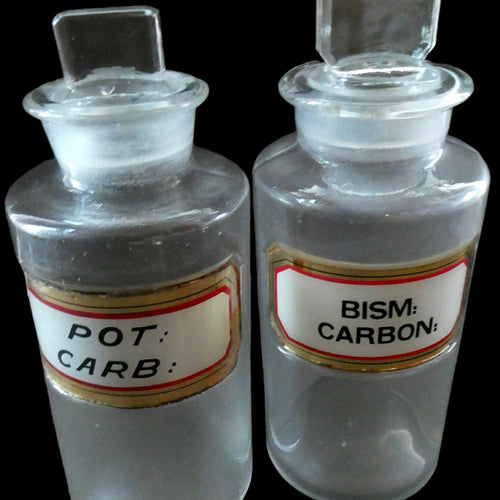 PAIR OF Larger Antique Clear Glass Chemist Bottles with Original Foil Labels and Lozenge Stoppers