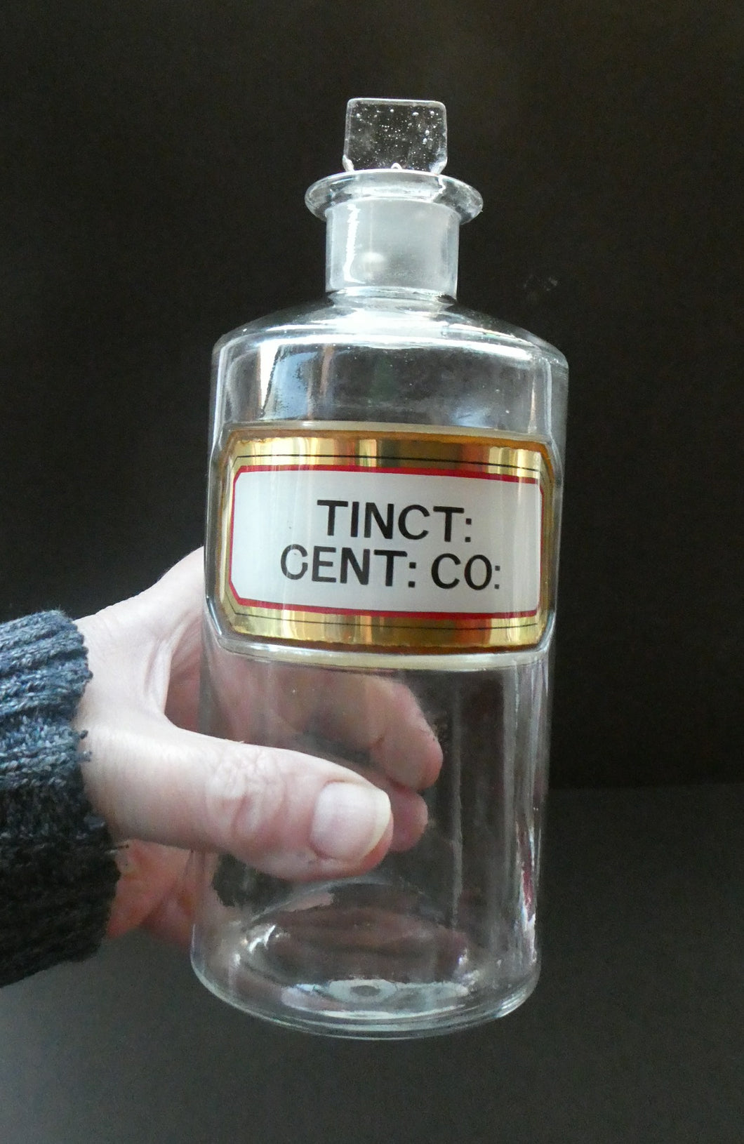 Larger Antique Clear Glass Chemist Bottle. TINCT: CENT: CO: with Original Foil Label and Lozenge Stopper