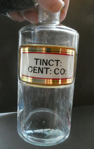 Larger Antique Clear Glass Chemist Bottle. TINCT: CENT: CO: with Original Foil Label and Lozenge Stopper