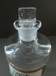 Larger Antique Clear Glass Chemist Bottle. TINCT: CENT: CO: with Original Foil Label and Lozenge Stopper