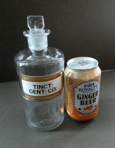 Larger Antique Clear Glass Chemist Bottle. TINCT: CENT: CO: with Original Foil Label and Lozenge Stopper