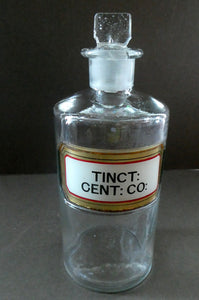 Larger Antique Clear Glass Chemist Bottle. TINCT: CENT: CO: with Original Foil Label and Lozenge Stopper