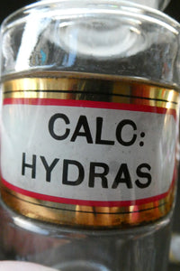 Antique Clear Glass Chemist Bottle. CALC: HYDRAS with Original Foil Label and Lozenge Stopper