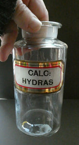 Antique Clear Glass Chemist Bottle. CALC: HYDRAS with Original Foil Label and Lozenge Stopper