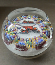 Load image into Gallery viewer, Vintage 1980s PERTHSHIRE PAPERWEIGHT. Millefiori Ground with Train Motif (PP 56)
