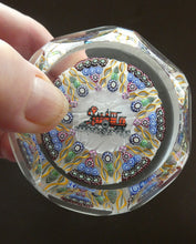 Load image into Gallery viewer, Vintage 1980s PERTHSHIRE PAPERWEIGHT. Millefiori Ground with Train Motif (PP 56)
