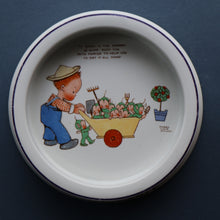 Load image into Gallery viewer, 1930s SHELLEY POTTERY Mabel Lucie Attwell Heavy Baby Plate. Gardening Image with Boo Boos in Wheelbarrow
