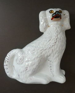 Staffordshire Dogs Chimney Spaniels / Wally Dugs. 8 1/2 inches. ANTIQUE PAIR with amber glass eyes; c1880