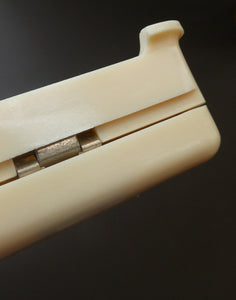 1930s Art Deco Cream Celluloid Trinket Box with Faux Decorative Clasps and a Hinged Lid