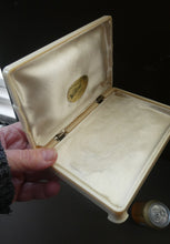 Load image into Gallery viewer, 1930s Art Deco Cream Celluloid Trinket Box with Faux Decorative Clasps and a Hinged Lid
