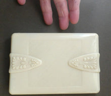 Load image into Gallery viewer, 1930s Art Deco Cream Celluloid Trinket Box with Faux Decorative Clasps and a Hinged Lid
