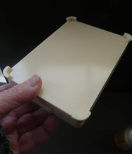 Load image into Gallery viewer, 1930s Art Deco Cream Celluloid Trinket Box with Faux Decorative Clasps and a Hinged Lid
