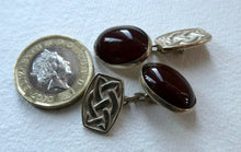 Load image into Gallery viewer, Scottish IONA Silver Cufflinks. Designed by John Hart with Knotwork Panel and the Other with Carnelians
