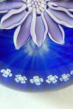 Load image into Gallery viewer, Scottish Paperweight by Peter McDougall Glass Studio. With Studio Cane on the Base with lilac lampwork flower 
