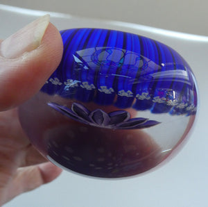 Scottish Paperweight by Peter McDougall Glass Studio. With Studio Cane on the Base with lilac lampwork flower 