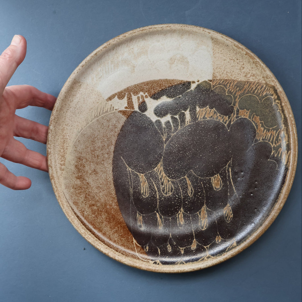 STUDIO POTTERY. Large Plate or Platter with Abstract Floral Motifs. Crich Pottery (Diana Worthy). 10 1/2 inches diameter