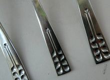 Load image into Gallery viewer, Vintage 1970s Stainless Steel SPANISH Cutlery by Ribera. Eight Dessert Spoons and One Large Serving Spoon Media 1 of 12
