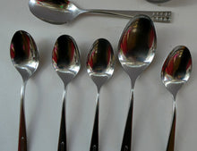 Load image into Gallery viewer, Vintage 1970s Stainless Steel SPANISH Cutlery by Ribera. Eight Dessert Spoons and One Large Serving Spoon Media 1 of 12
