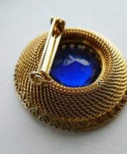 Load image into Gallery viewer, Vintage Costume Brooch with Heart Shapes on Rim and Blue Faceted Glass Insert
