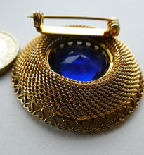 Load image into Gallery viewer, Vintage Costume Brooch with Heart Shapes on Rim and Blue Faceted Glass Insert
