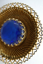 Load image into Gallery viewer, Vintage Costume Brooch with Heart Shapes on Rim and Blue Faceted Glass Insert
